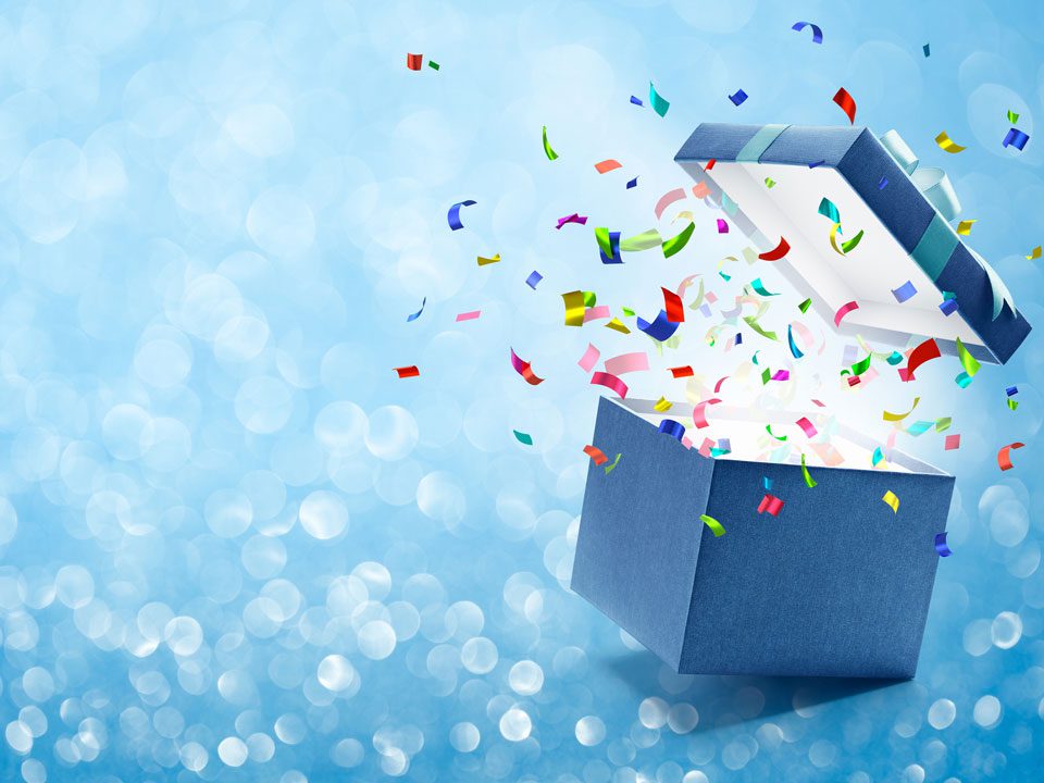 Confetti popping out from gift box